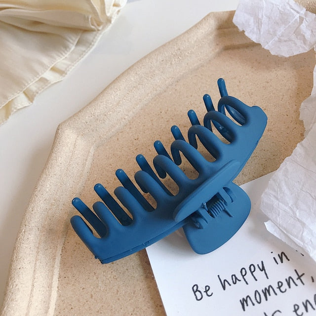 Jumbo hair claw clip in a cool ocean blue shade