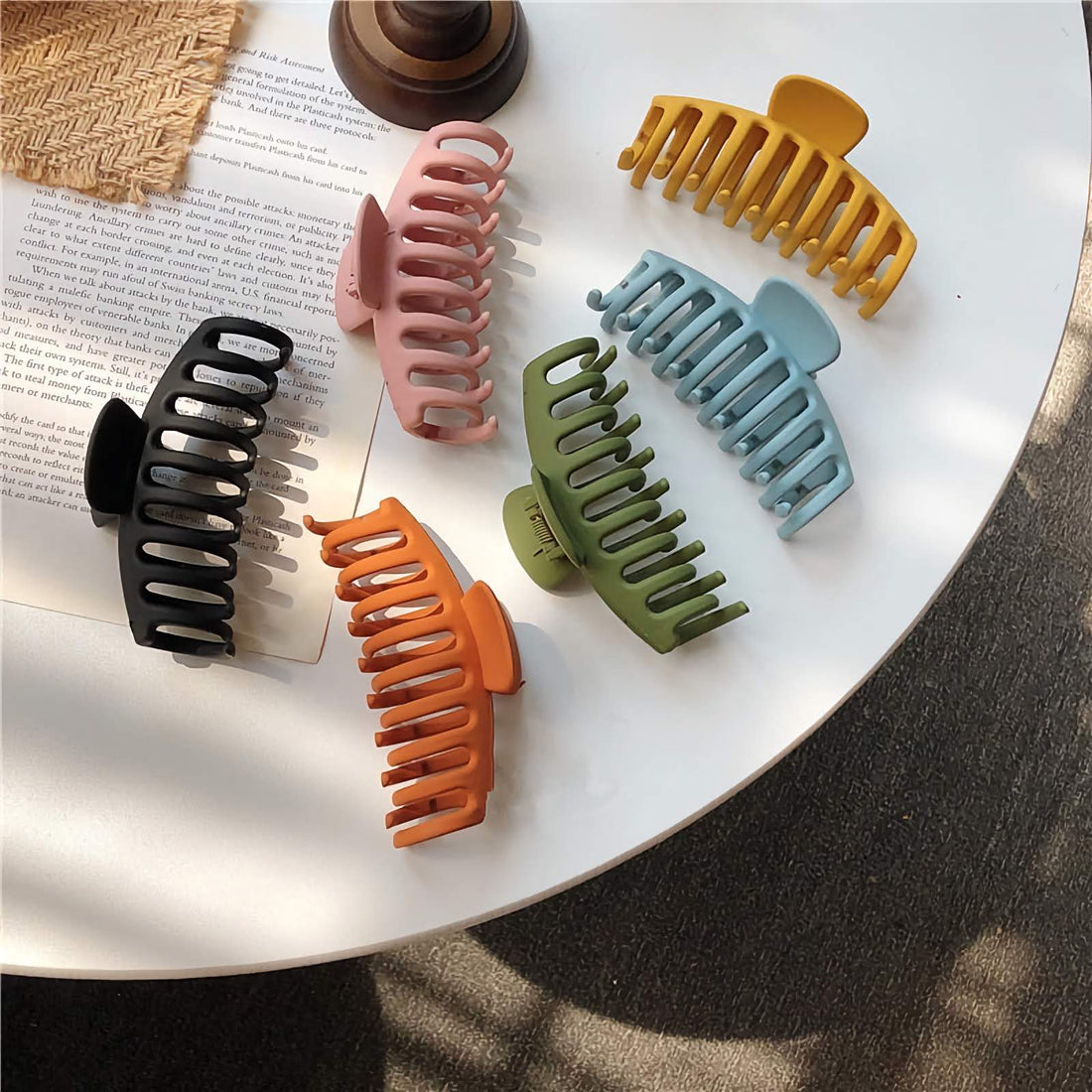 A large and stylish jumbo acrylic hair claw clip in classic black