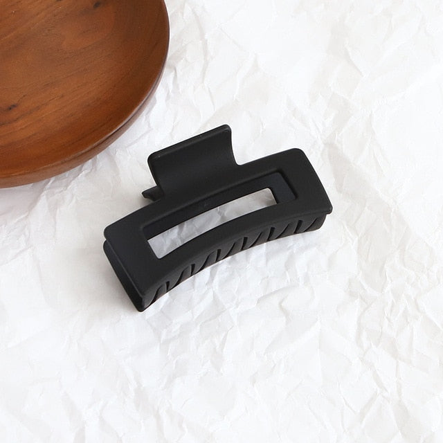 Textured jumbo acrylic hair claw clip with a matte surface."