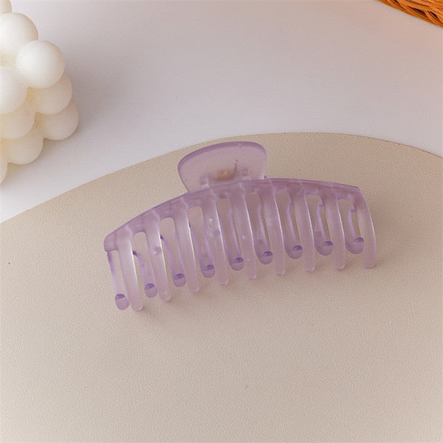 Translucent lavender jumbo hair claw clip for a soft touch.