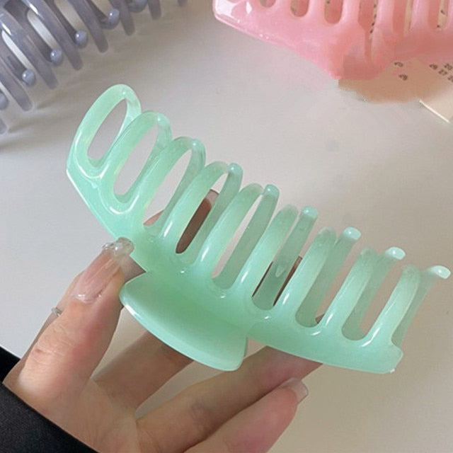 Glossy finish jumbo acrylic hair claw clip in emerald green